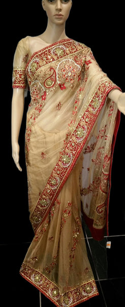 Net saree with rich embroidery and stonework detail